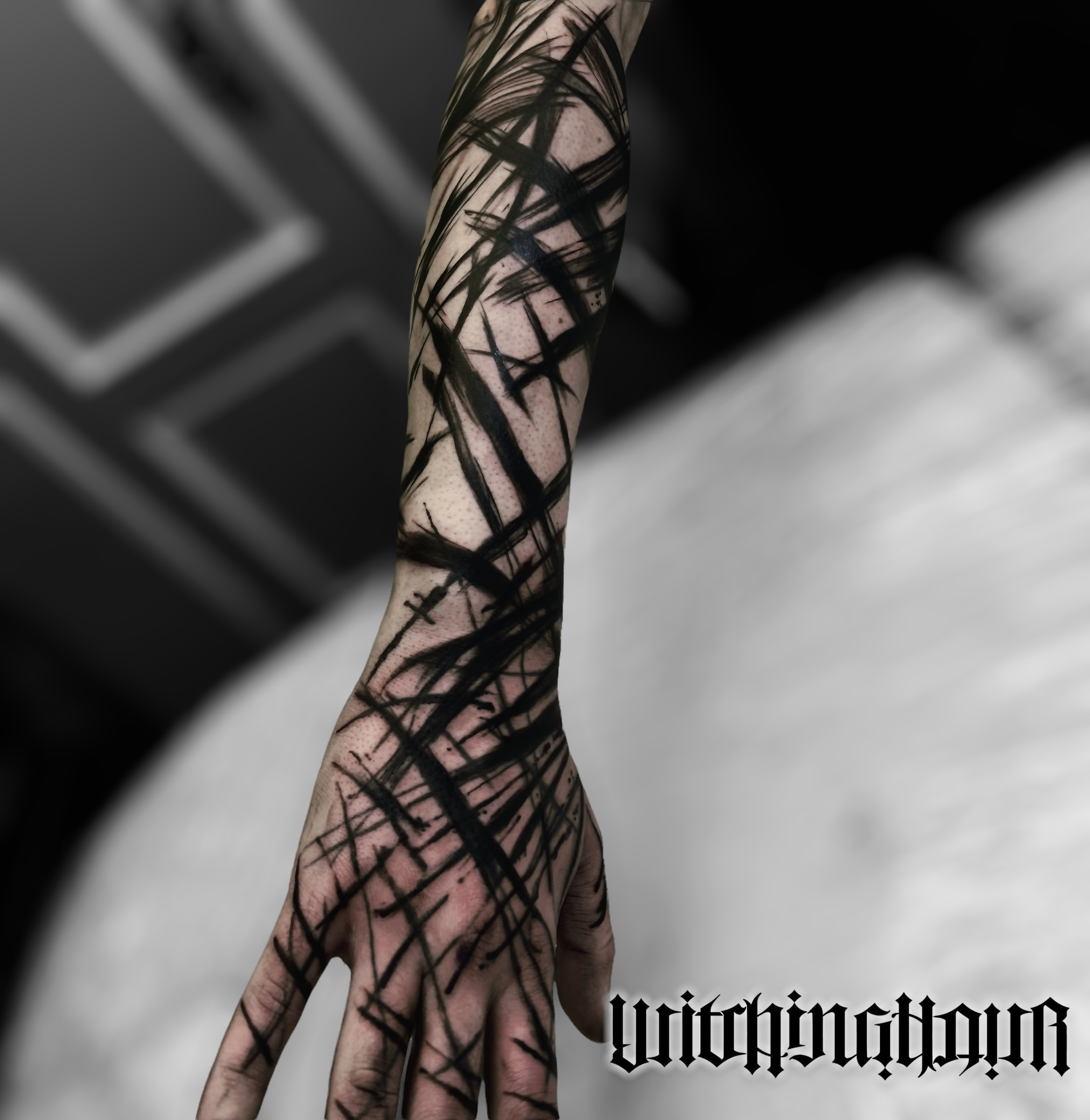 Abstract blackwork tattoo